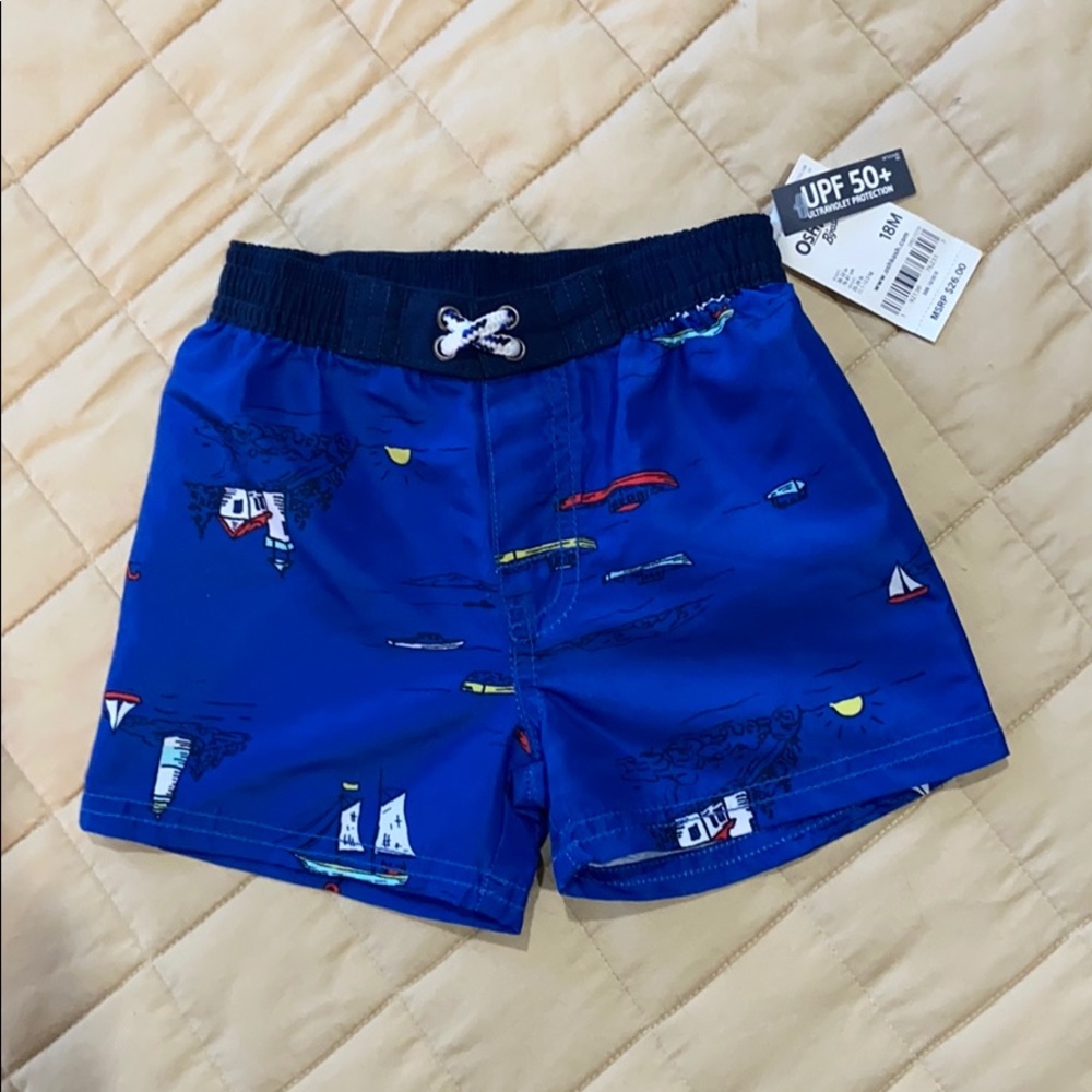 Toddler blue swim shorts with boats